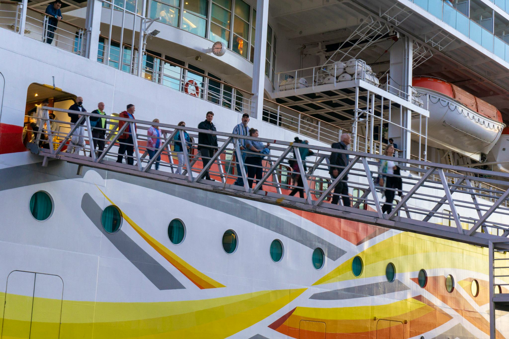 Passengers disembarking from cruise ship